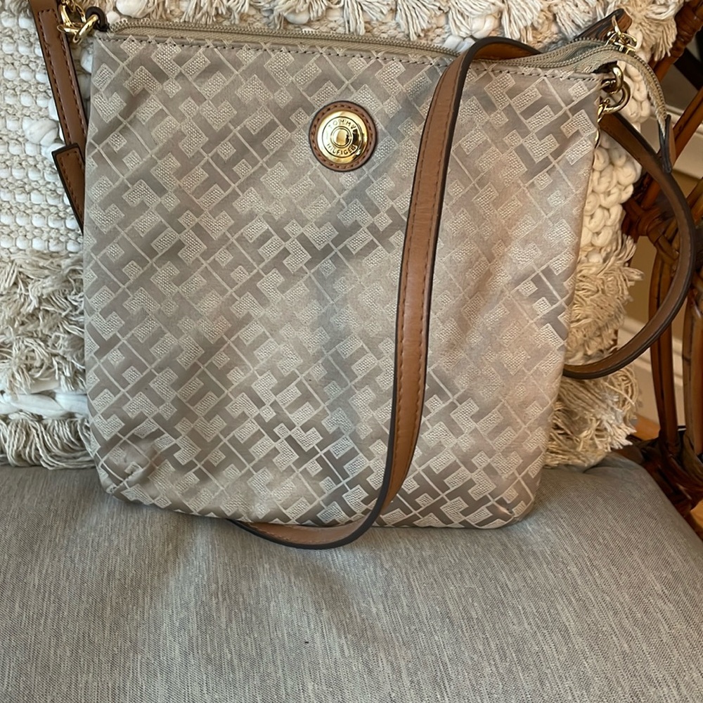 Tommy Hilfiger cross over bag with adjustable straps around 9 1/2 W/L